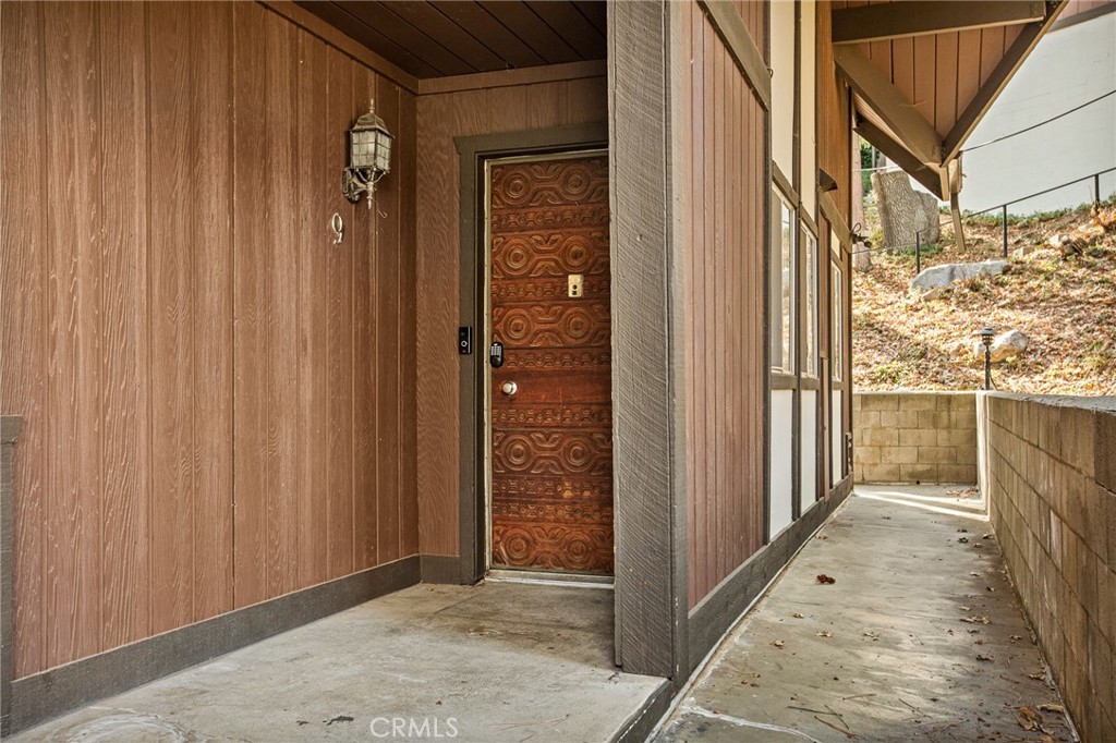 a view of a brick house with a door