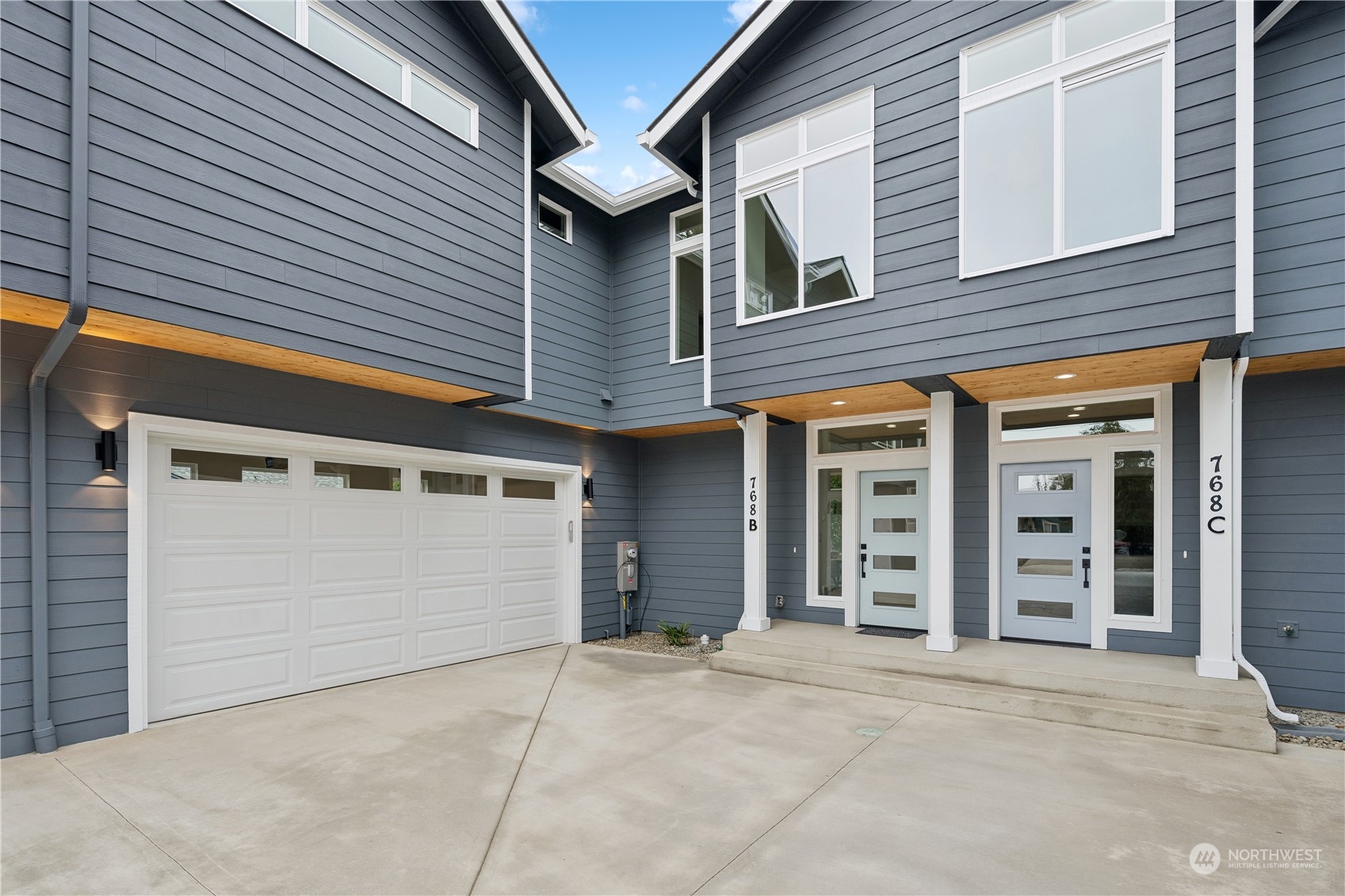 a view of a house with a parking space