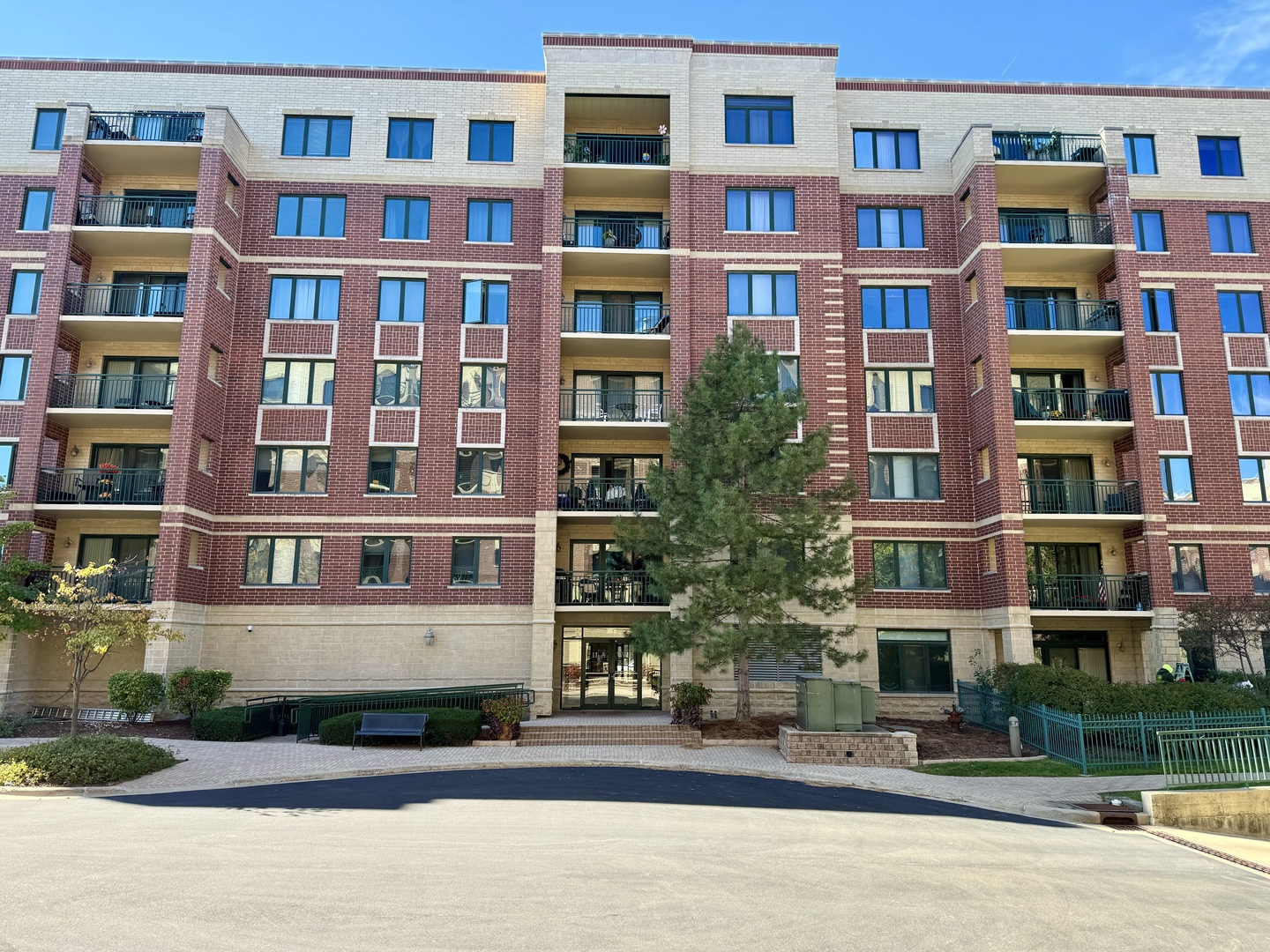 a front view of a building with street view