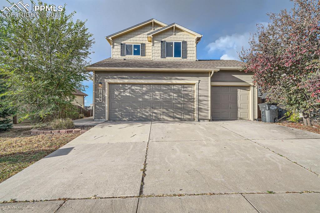 View of front of home with a garage