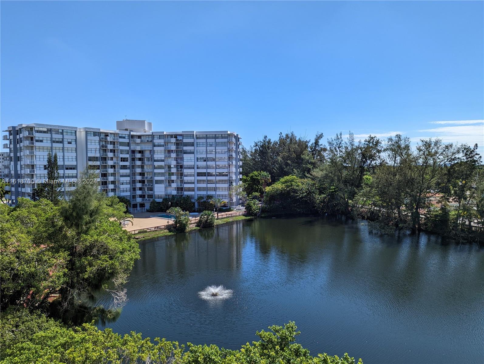 a view of a lake with building in front of it