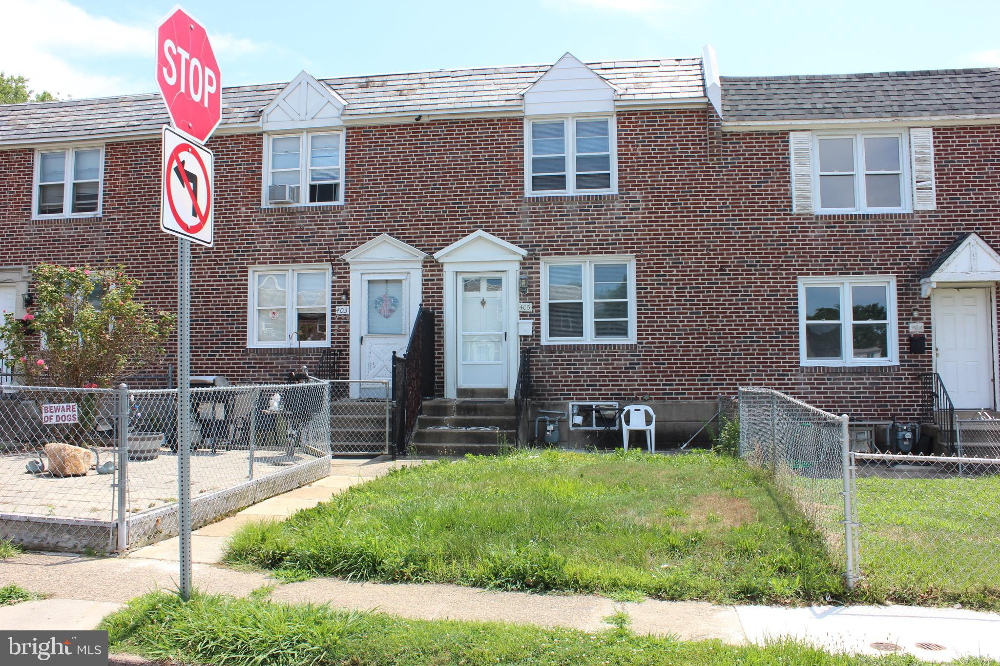 a front view of house with yard