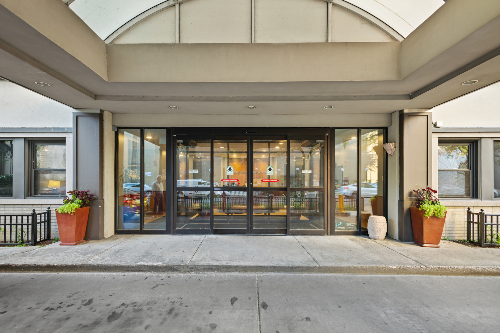 a view of a entryway door with an outdoor seating