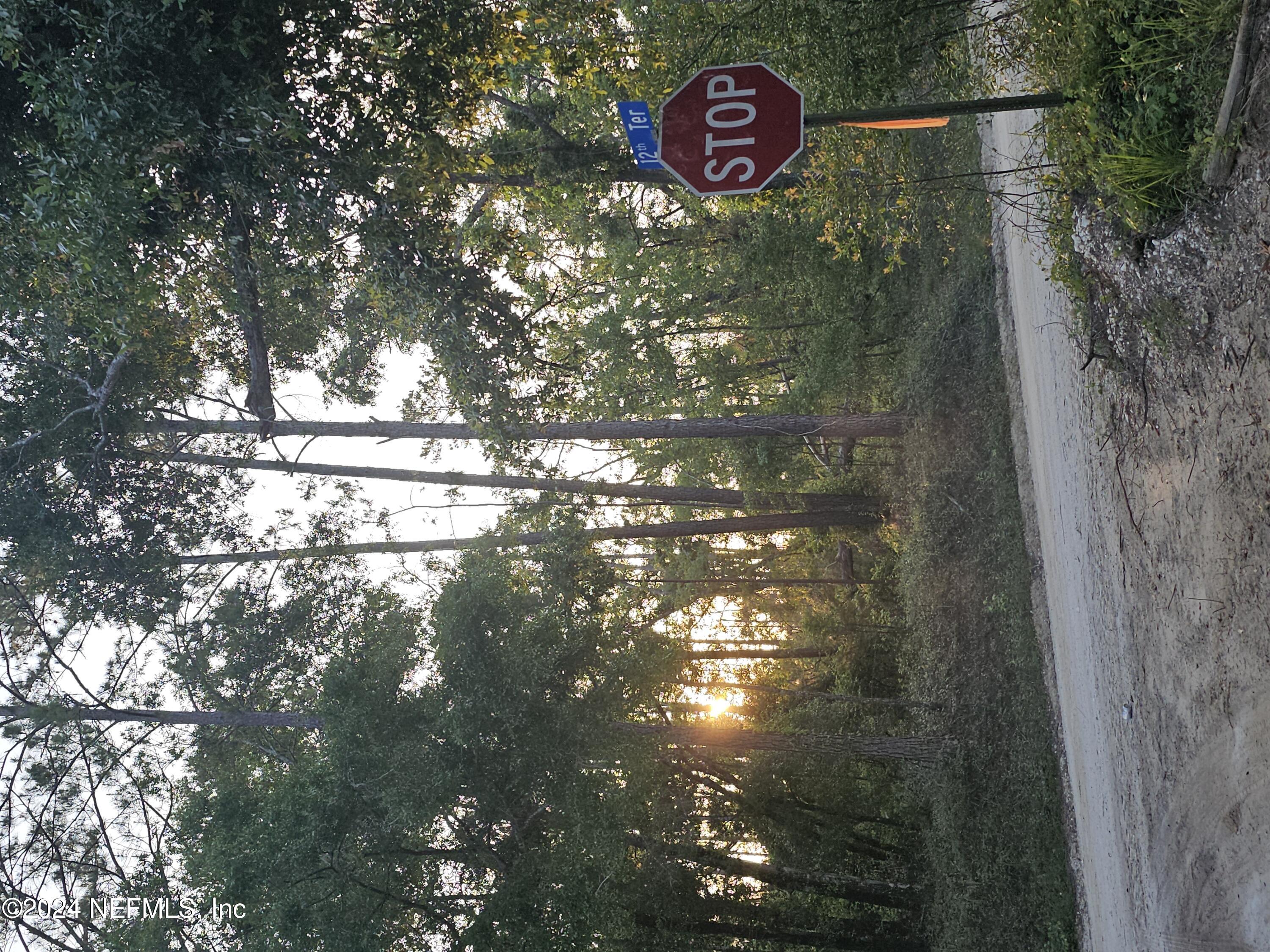 a sign that is on the side of a road