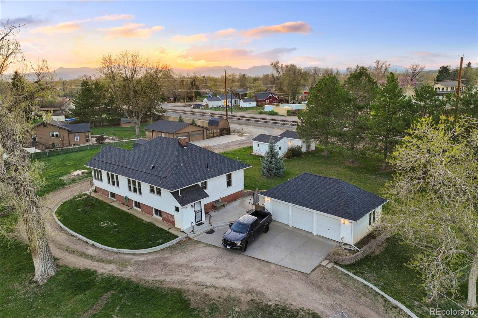 a aerial view of a house with garden