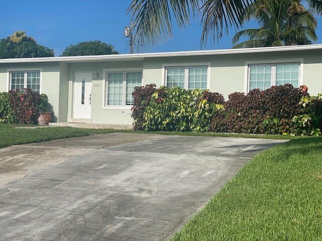 front view of house with a yard