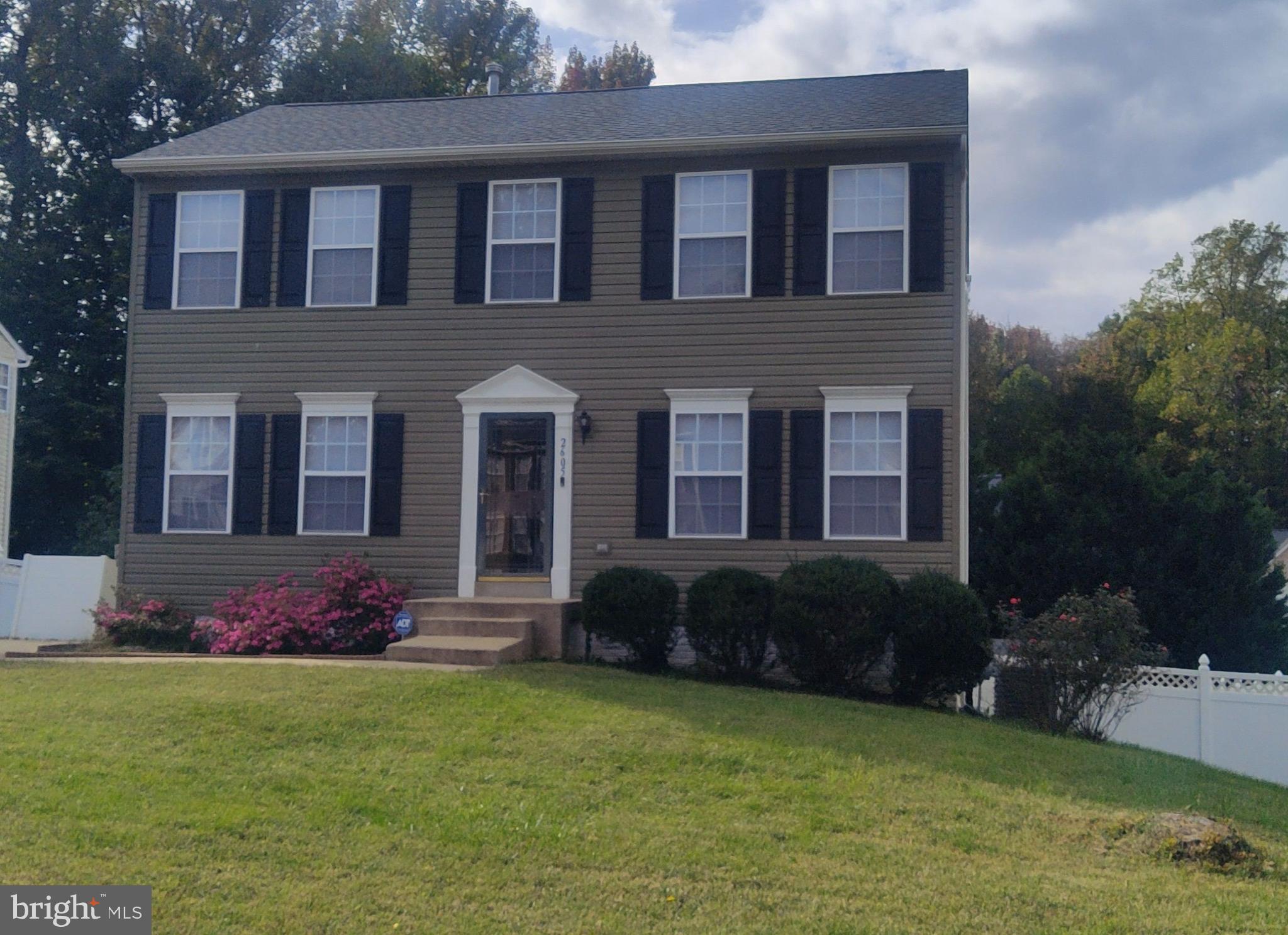 a front view of house with yard