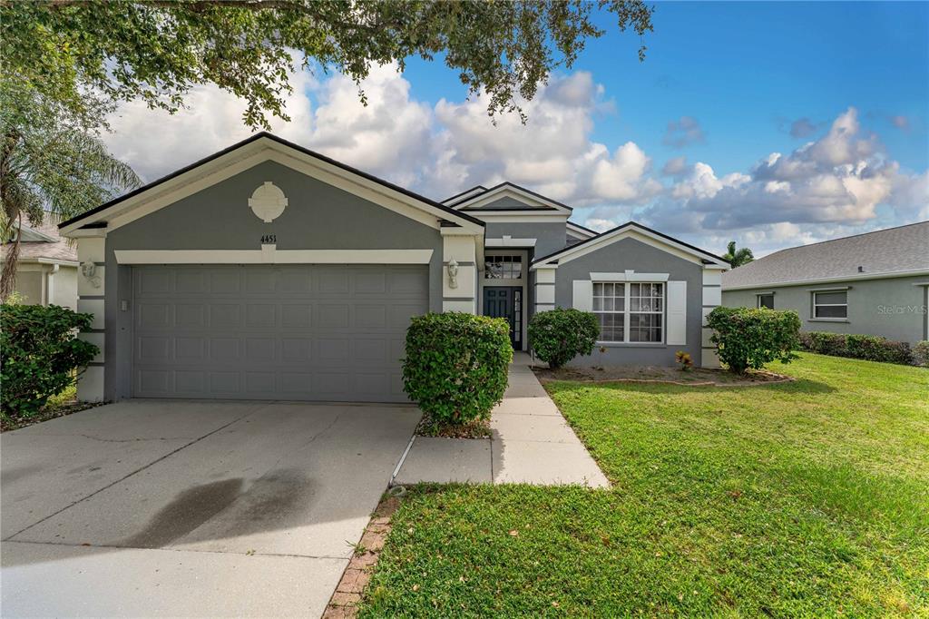 front view of a house with a yard