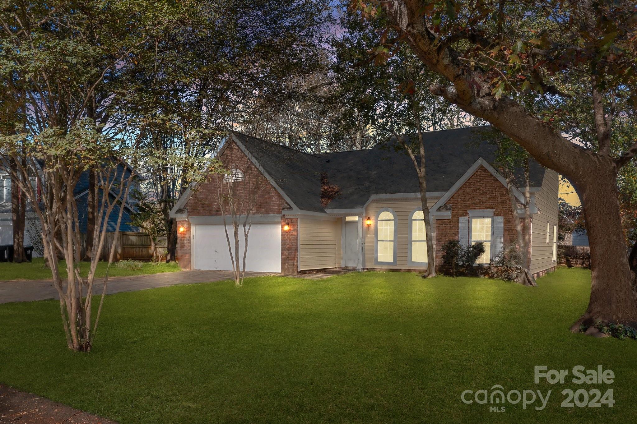 a house view with a garden space