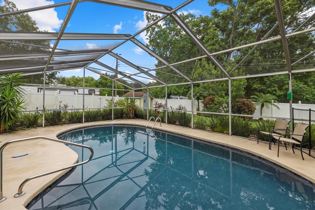 a view of a swimming pool with a patio