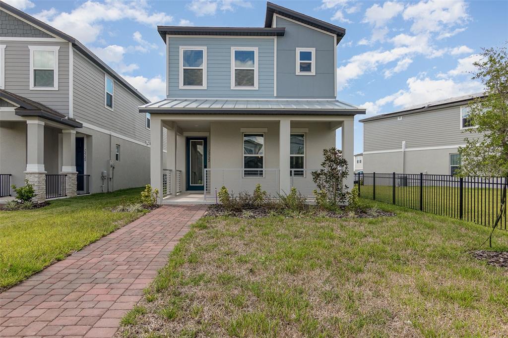 a house view with a backyard space