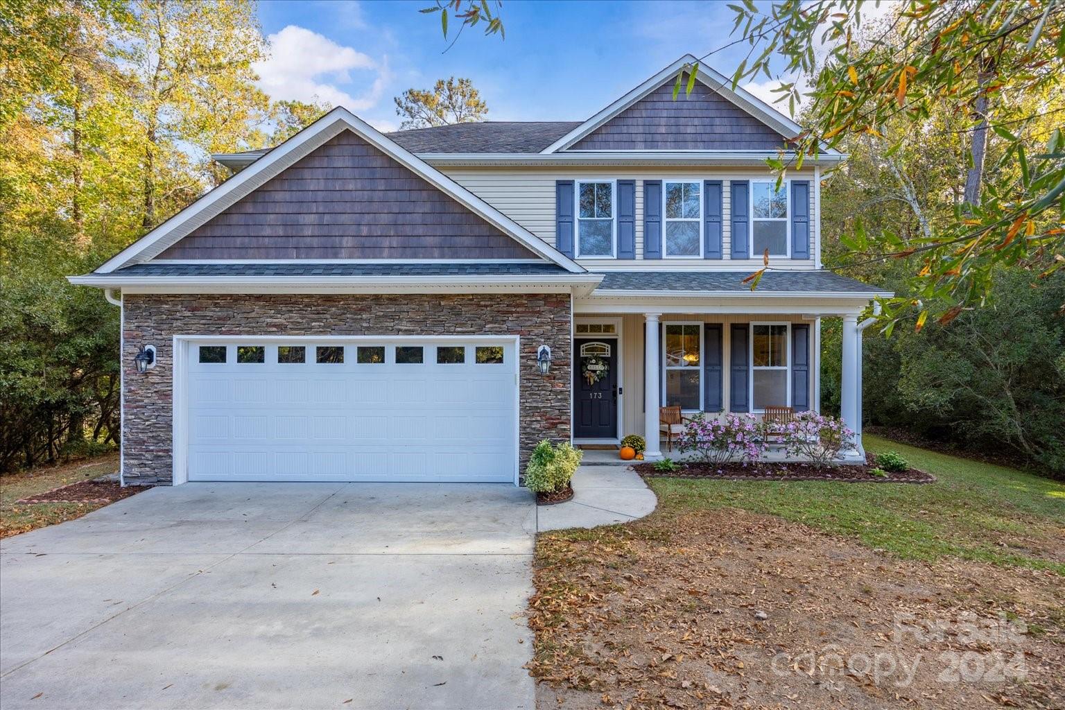 front view of a house with a yard