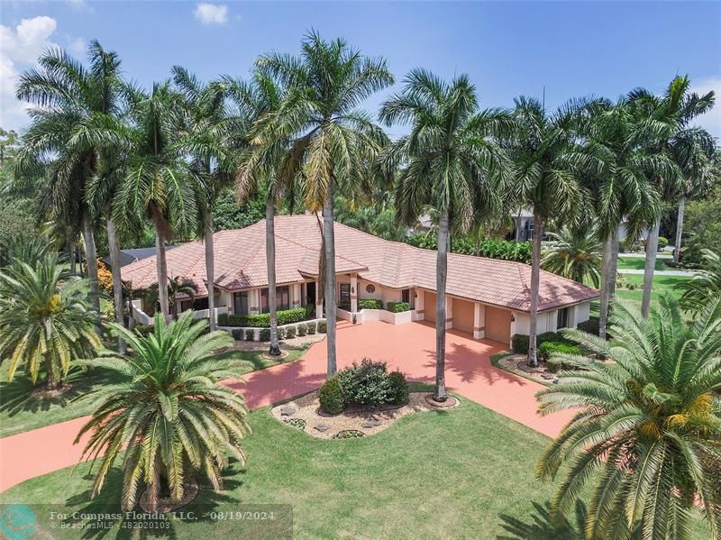 a view of a backyard with a patio