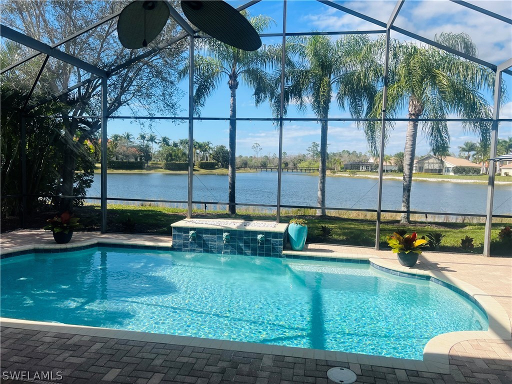 a view of a backyard with sitting area