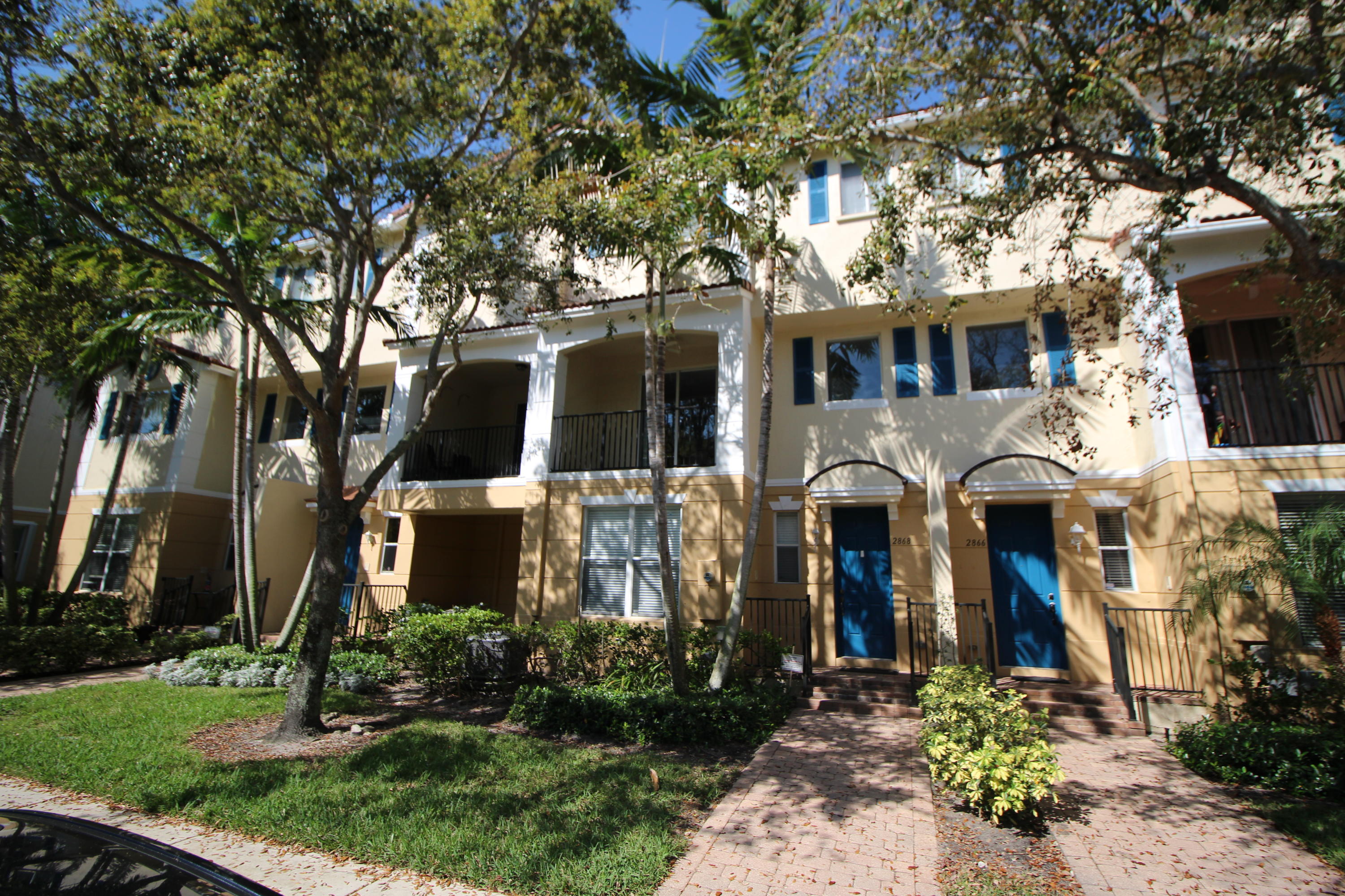 a front view of house with a yard