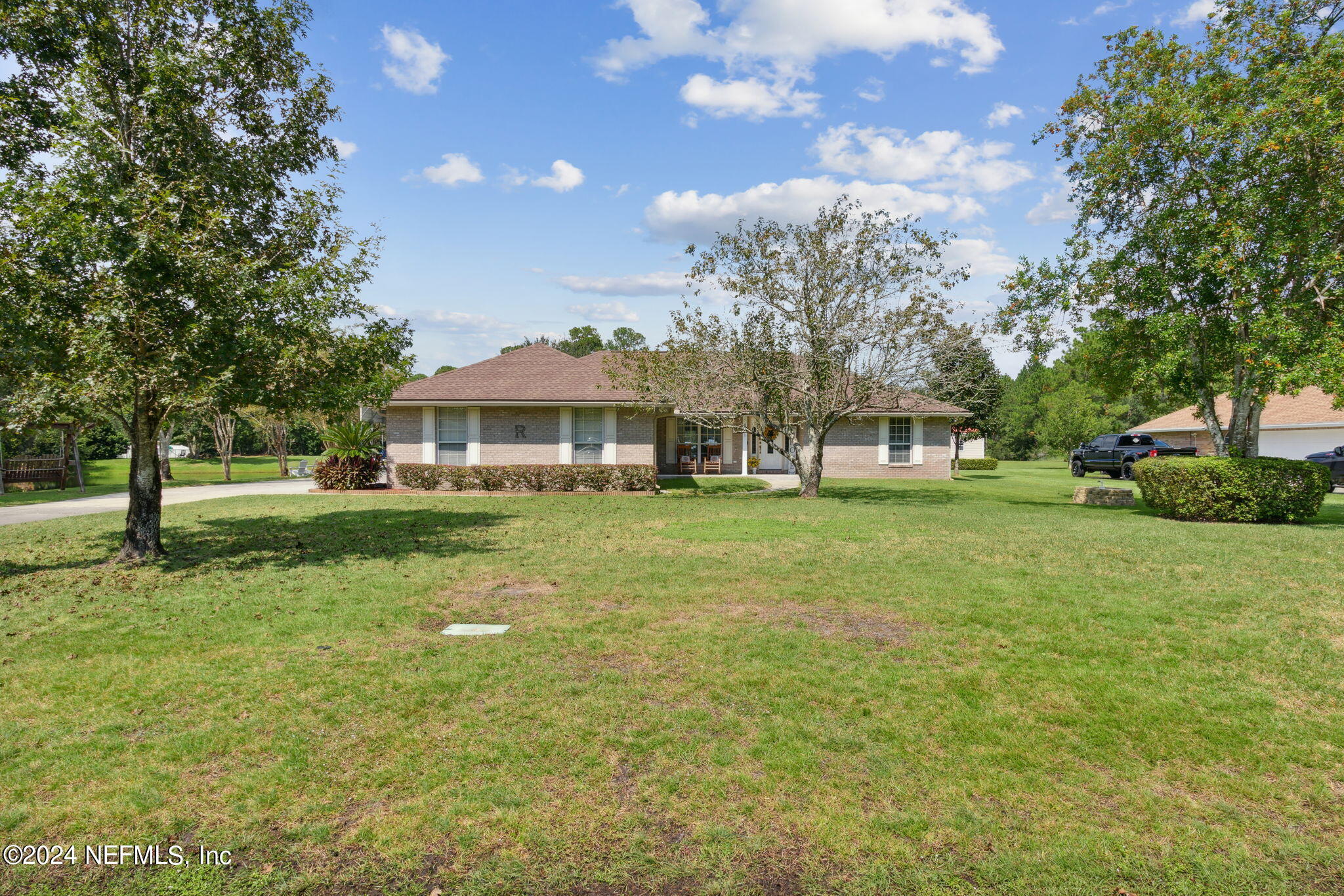 a view of house with garden