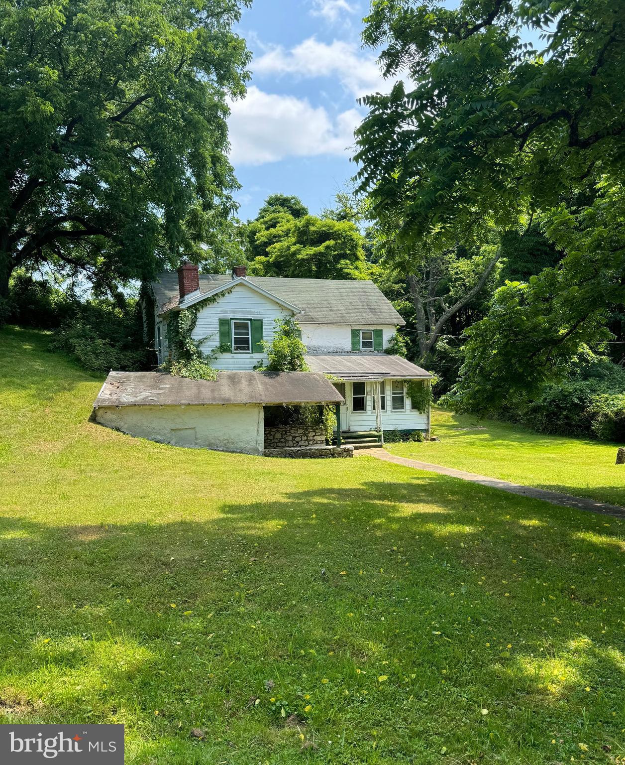 a front view of a house with swimming pool