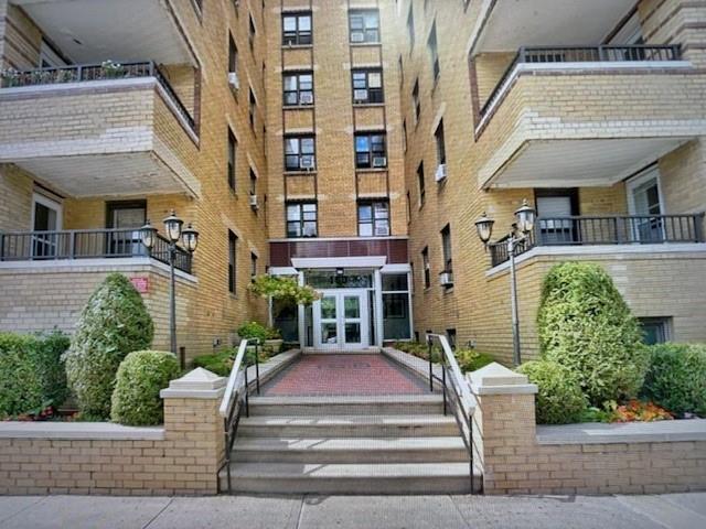 a view of a building with a porch