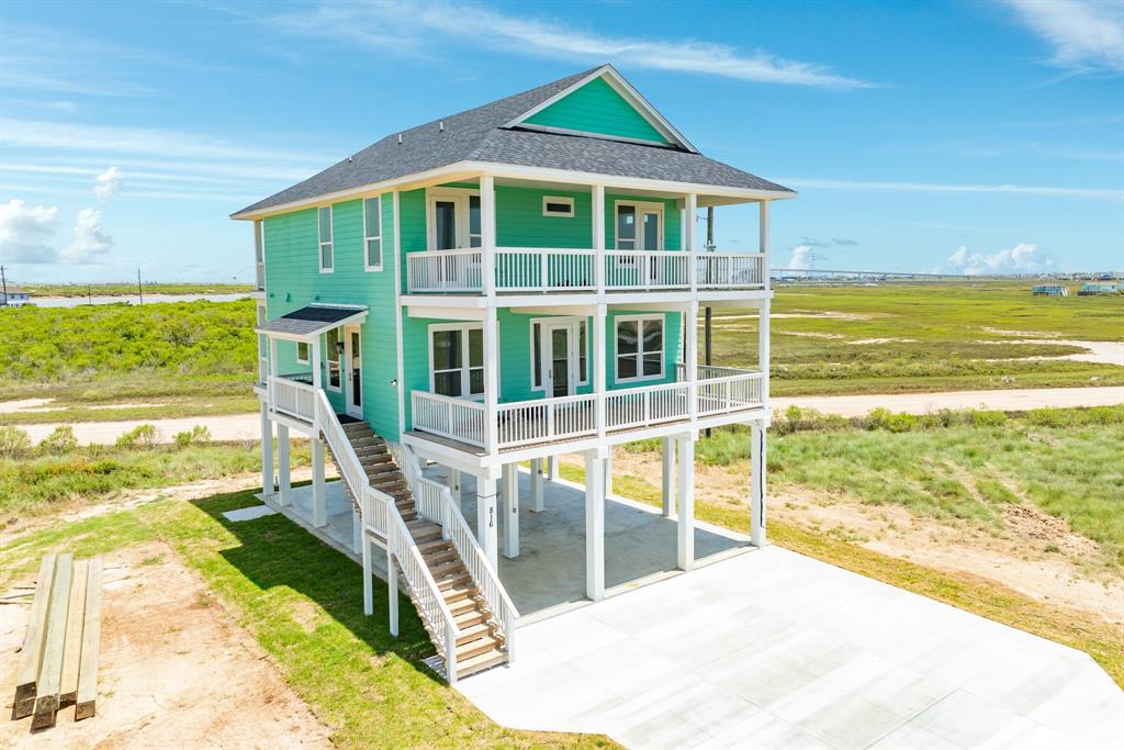 a view of a house with a ocean view