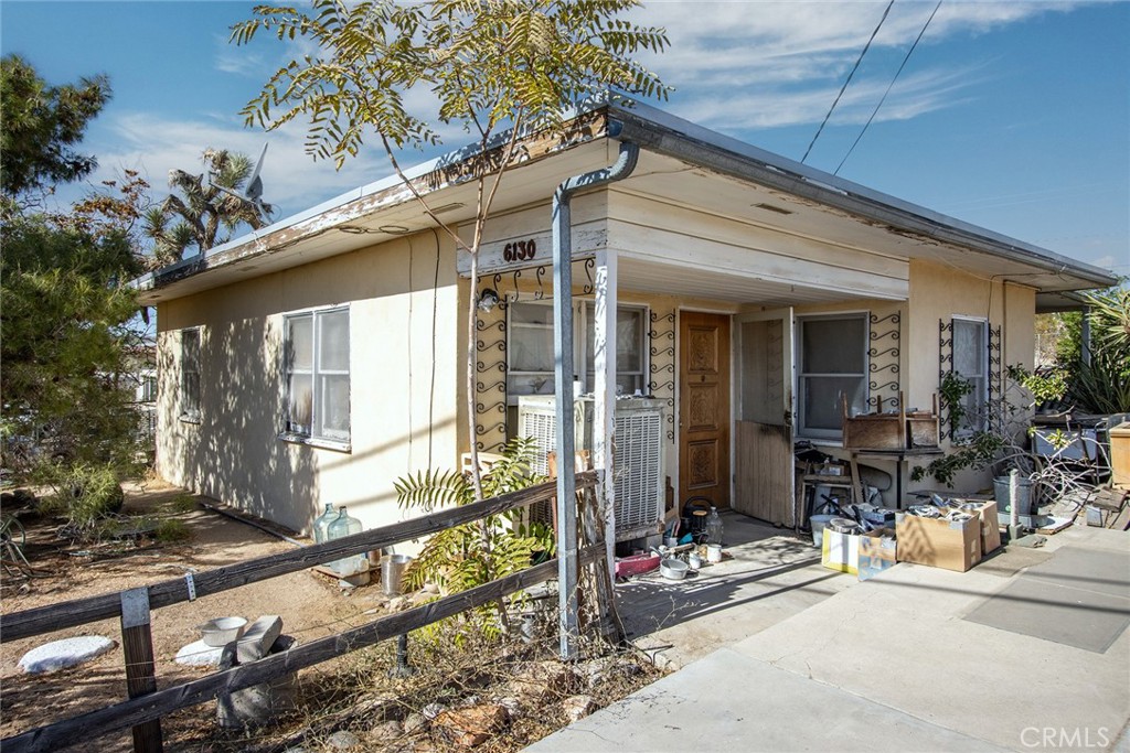 a view of house with outdoor seating