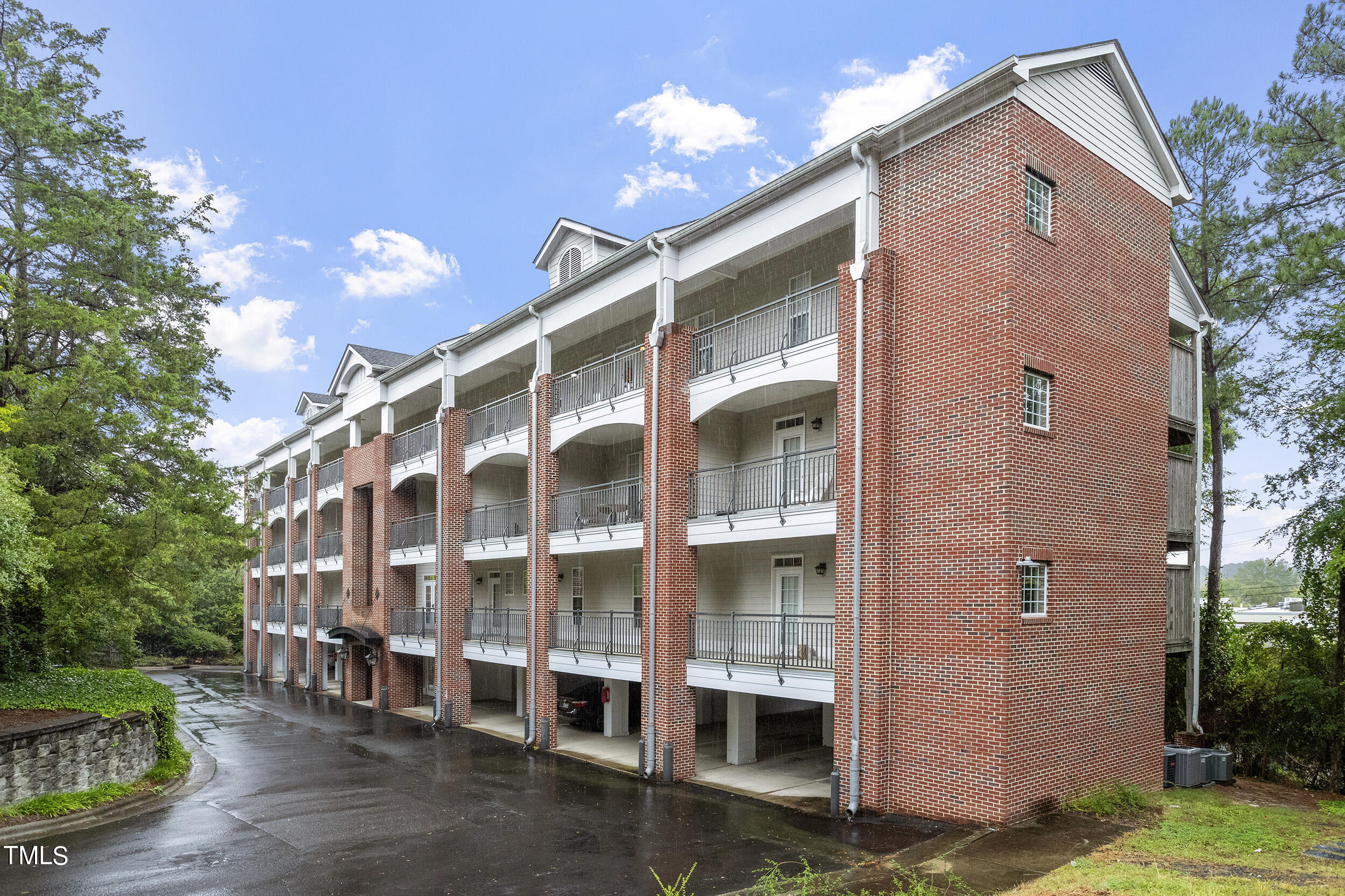 a view of a building with a yard