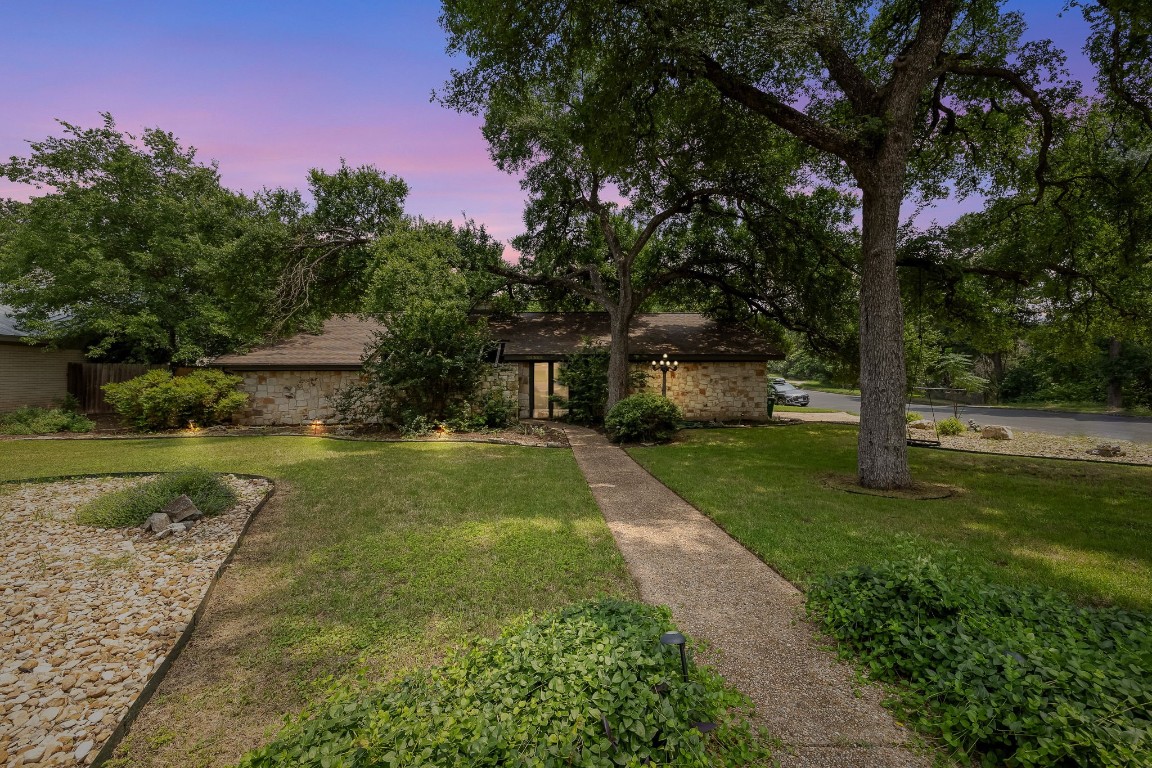 This property is on a gorgeous tree-filled third of an acre literally across the street from one of the trailheads at Walnut Creek Metropolitan Park. As it backs to Walnut Creek and because it is a corner lot, it only has one adjacent neighbor.