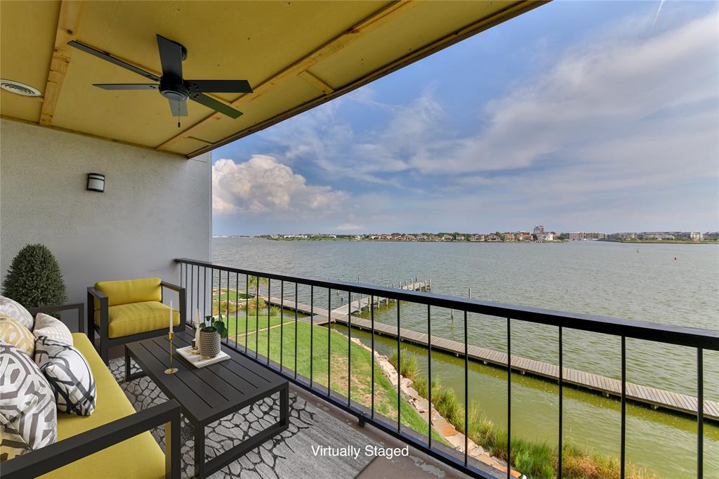 a view of balcony with furniture