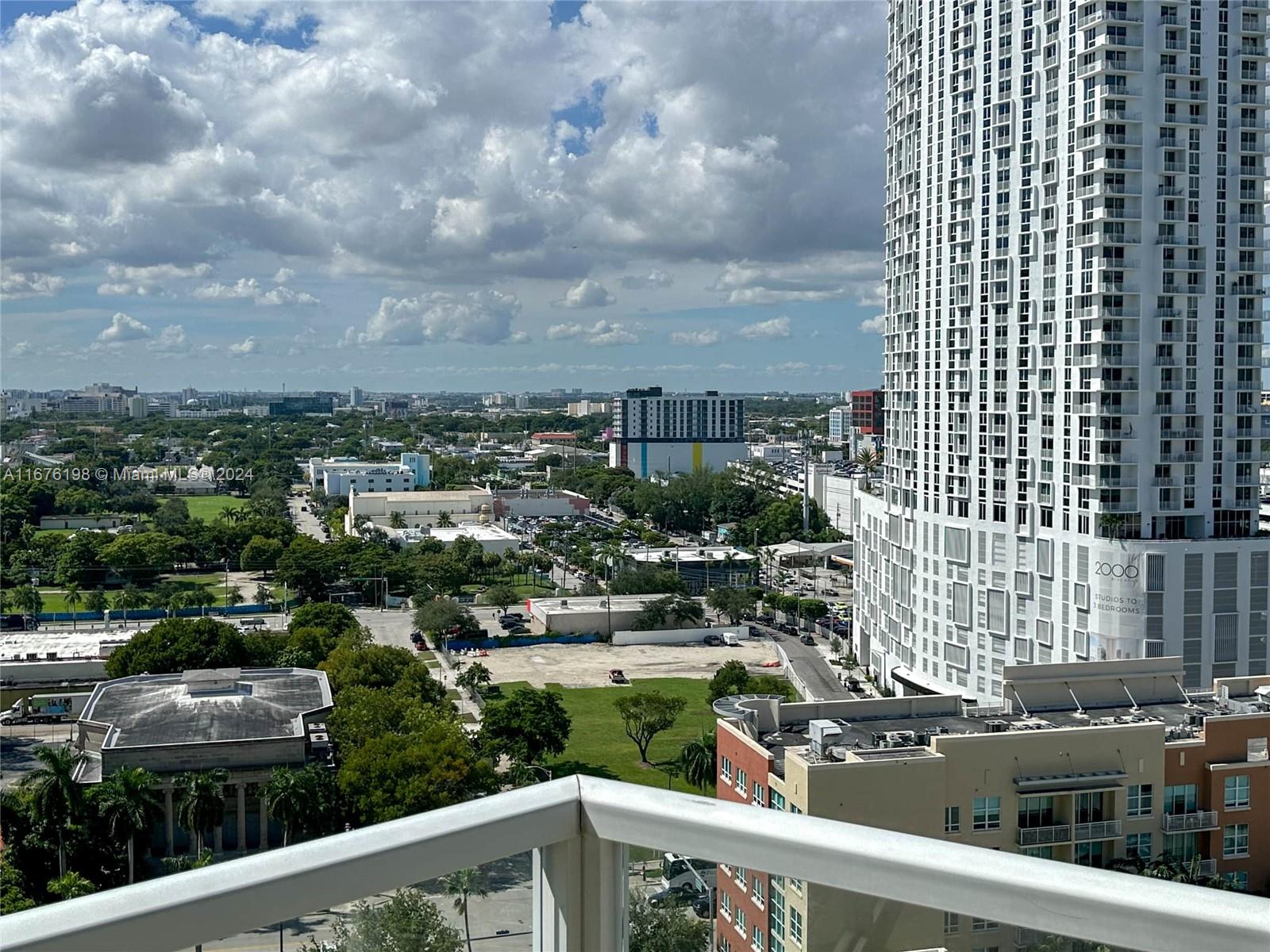 a view of a city from a balcony