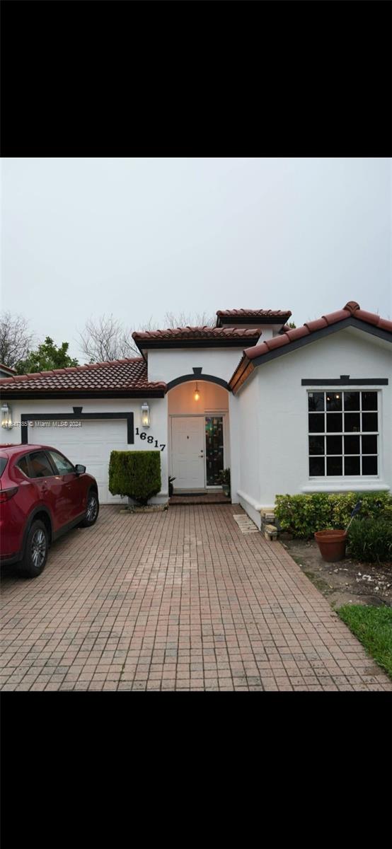 a view of a house with a patio