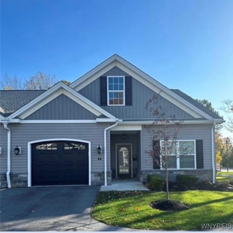 Beautiful Landscaped Entry with Garage