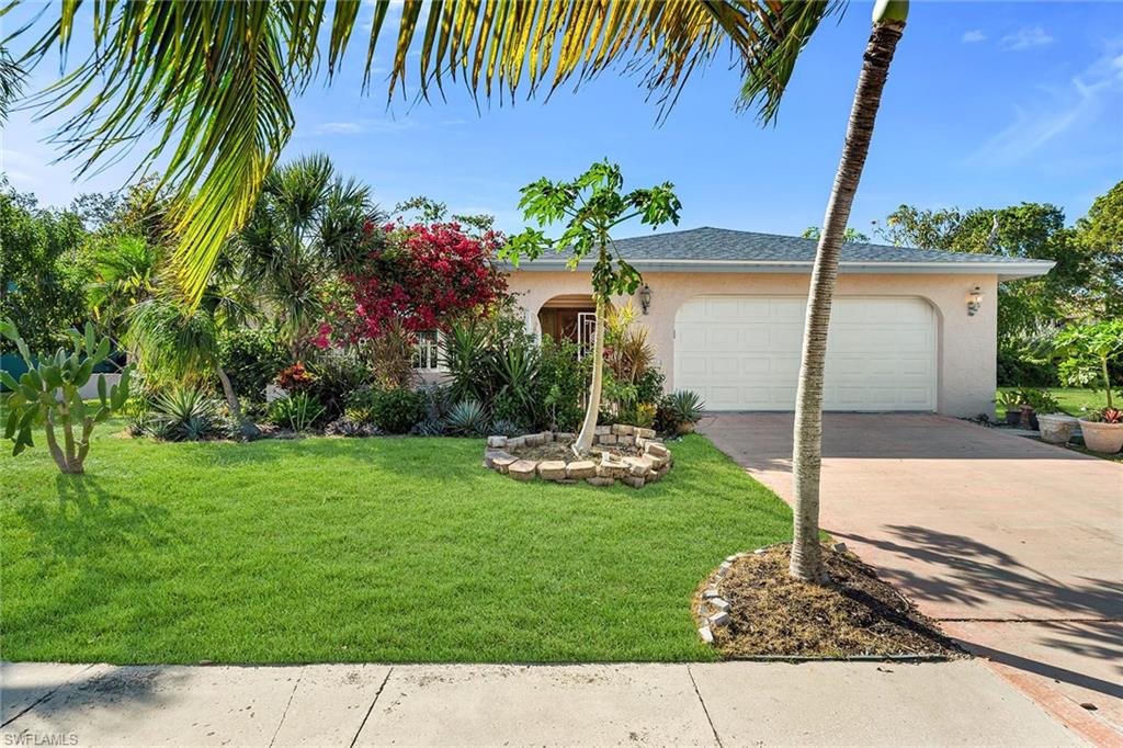 a view of a backyard with a garden