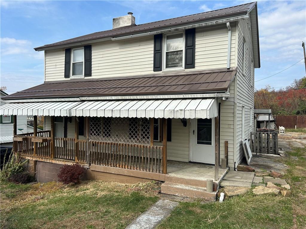 a front view of a house with garage