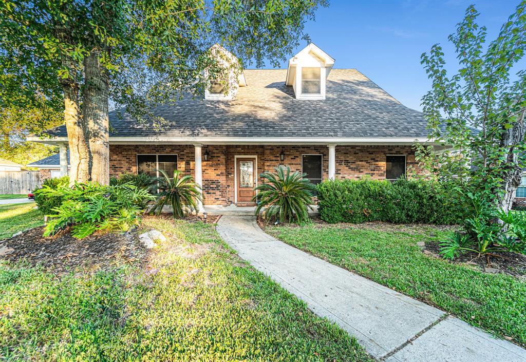 Have a cup of coffee on your beautiful front covered patio.