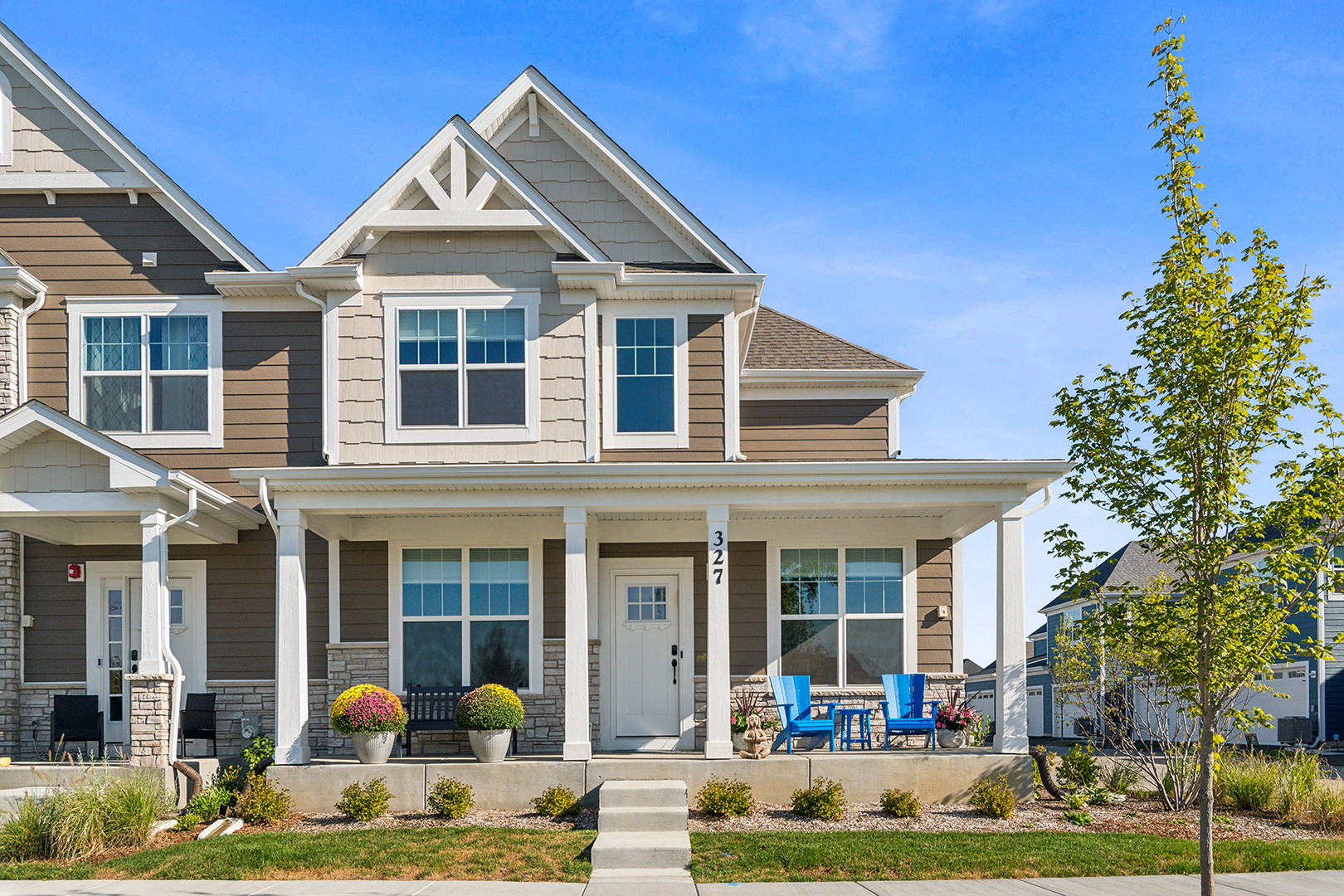 front view of a house with a yard