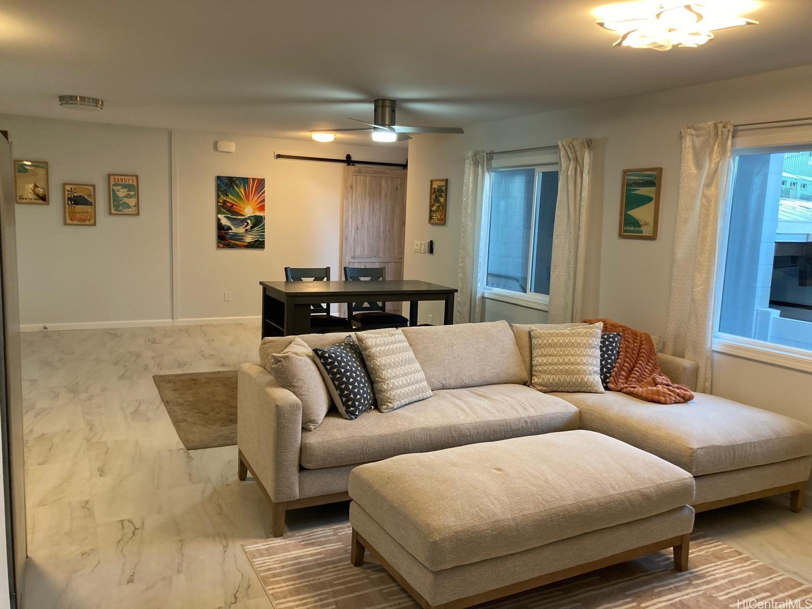 a living room with furniture and a couch