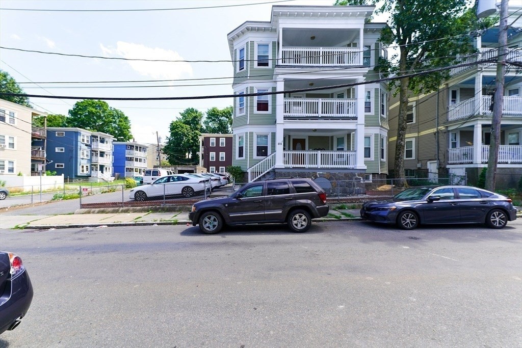 a car parked in front of a building