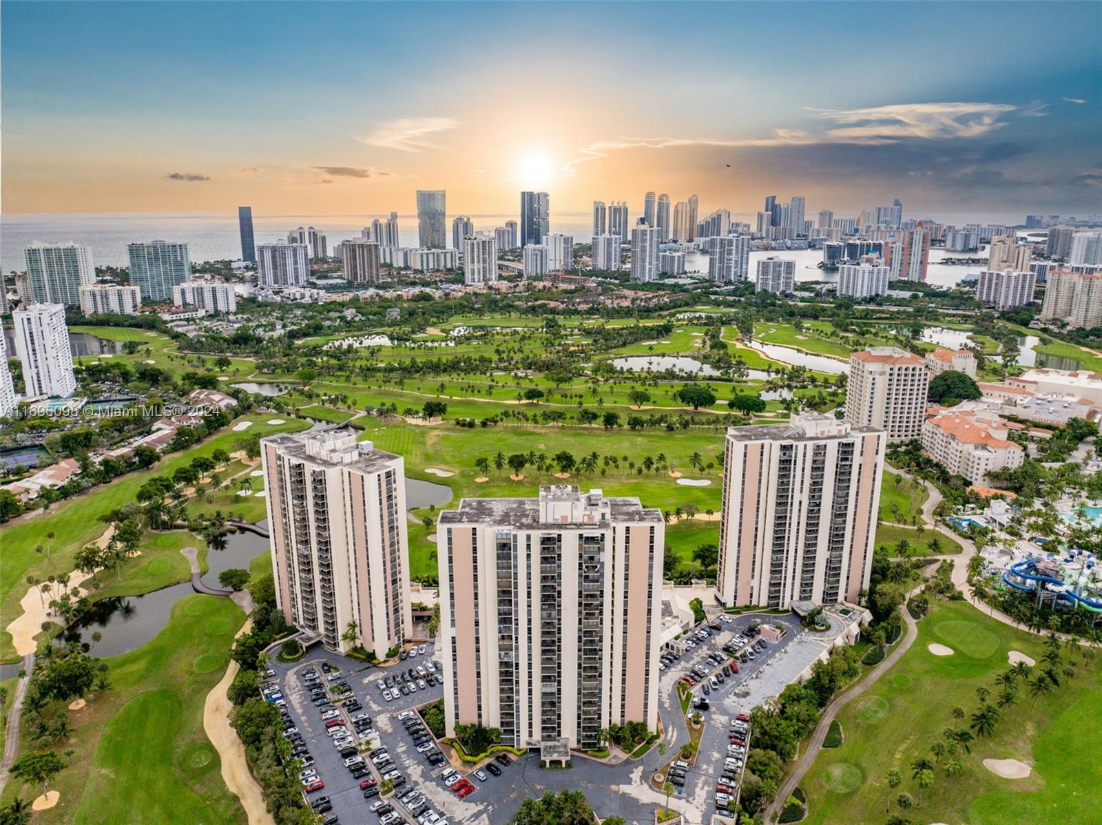 a view of a city with tall buildings