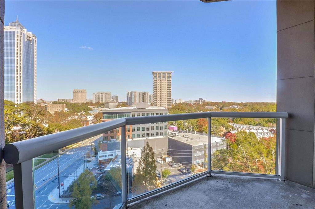 a view of a balcony with city view