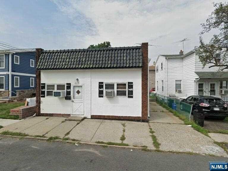 a view of a house with a patio