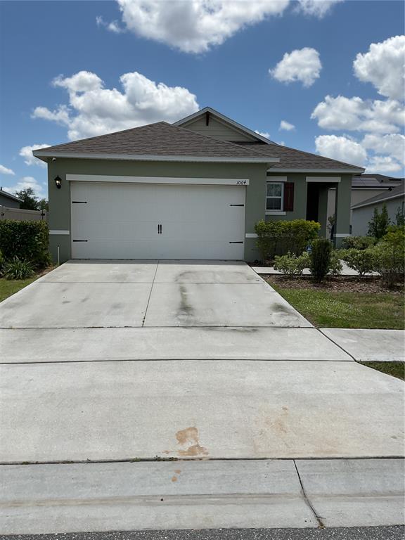 a front view of house with yard