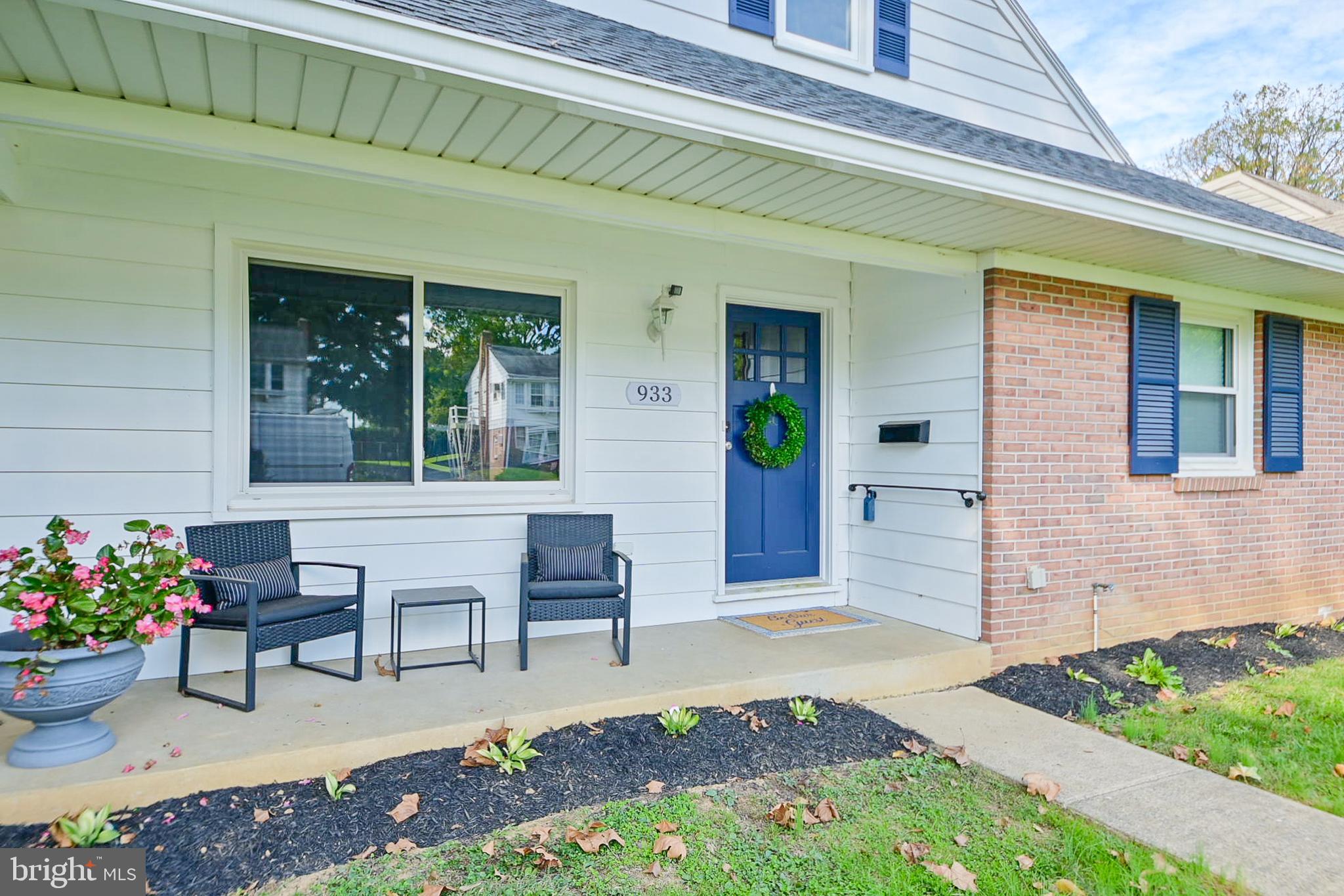 a front view of a house with a porch