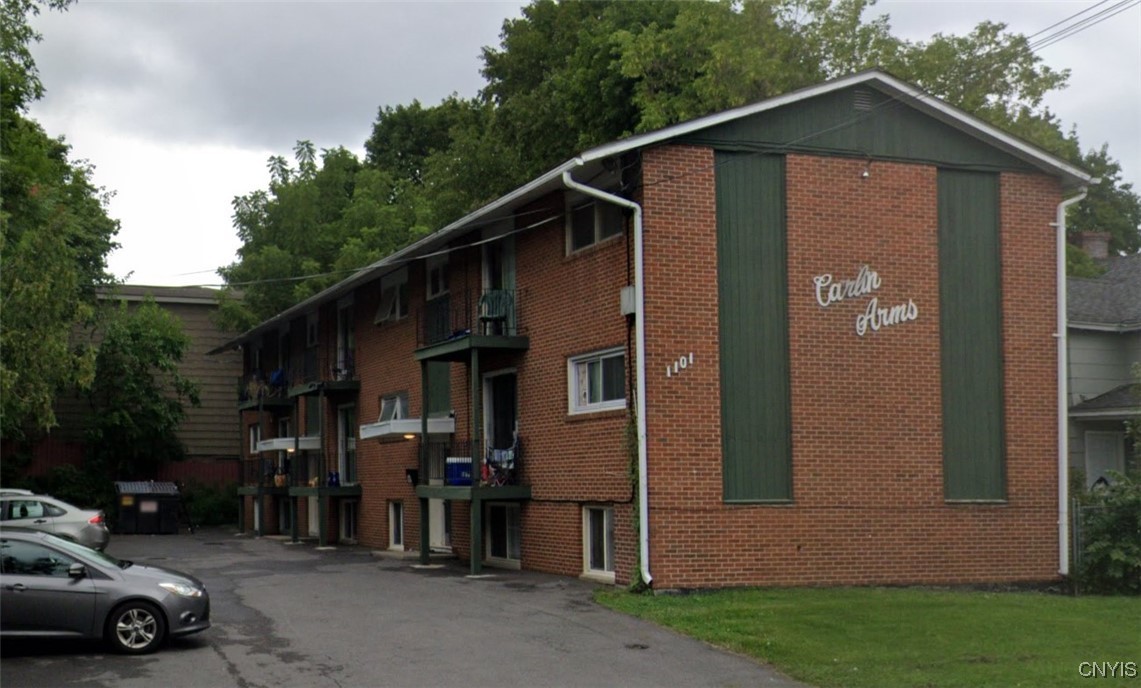 Apartment Building exterior and parking lot