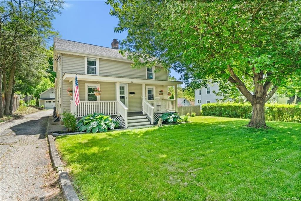 Charming Village Home with Detached 2-car garage and loft