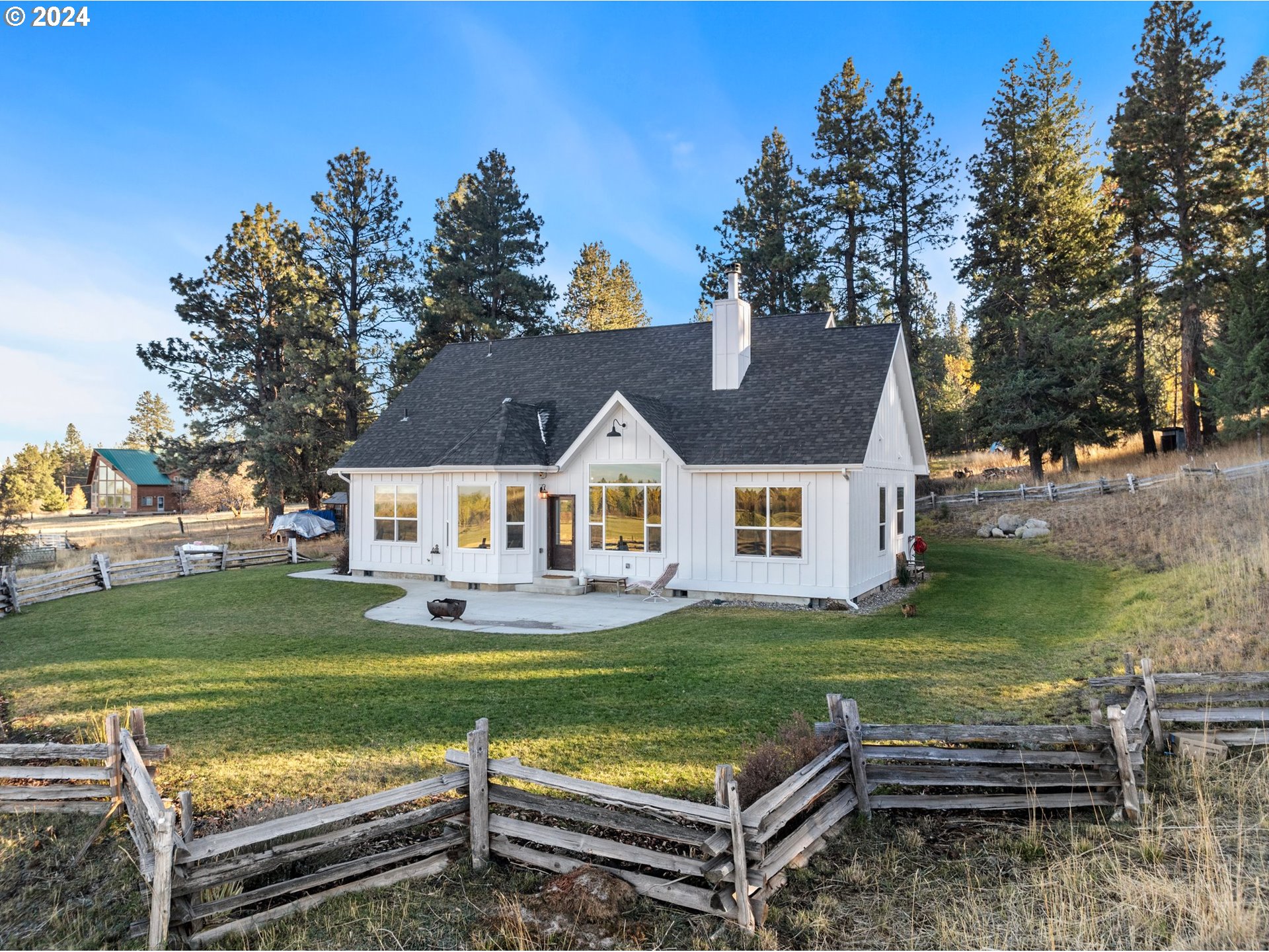 a view of a house with a big yard