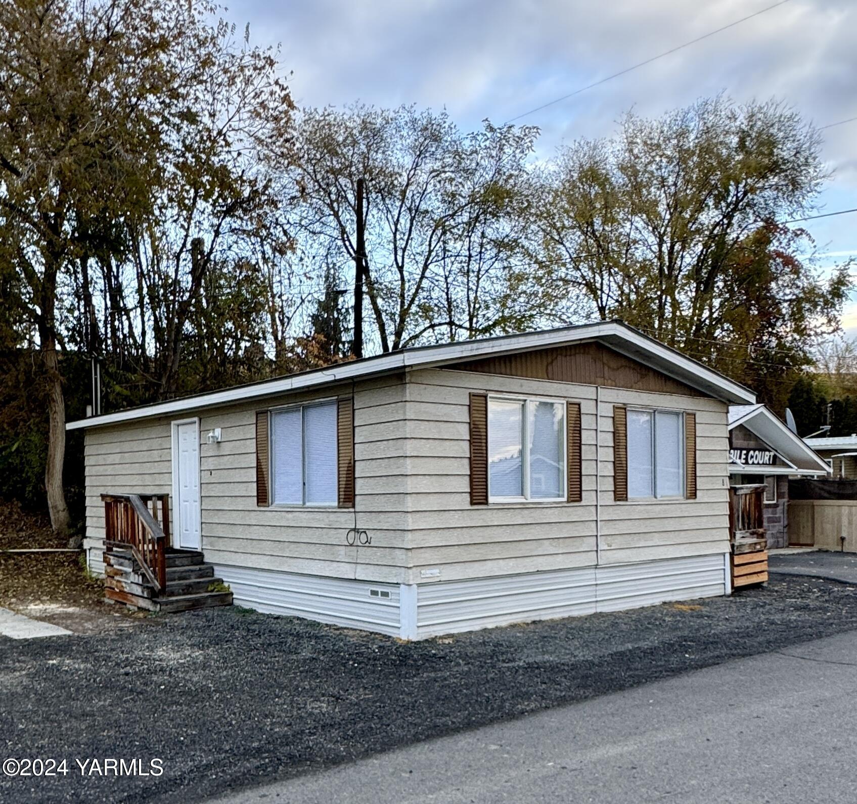 a view of a house with a garage