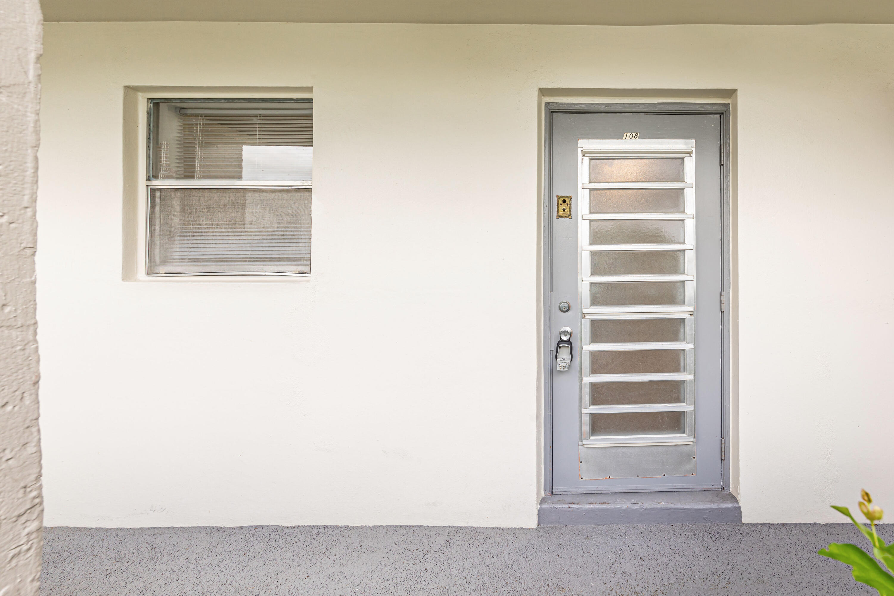 a view of a room that has a window in it