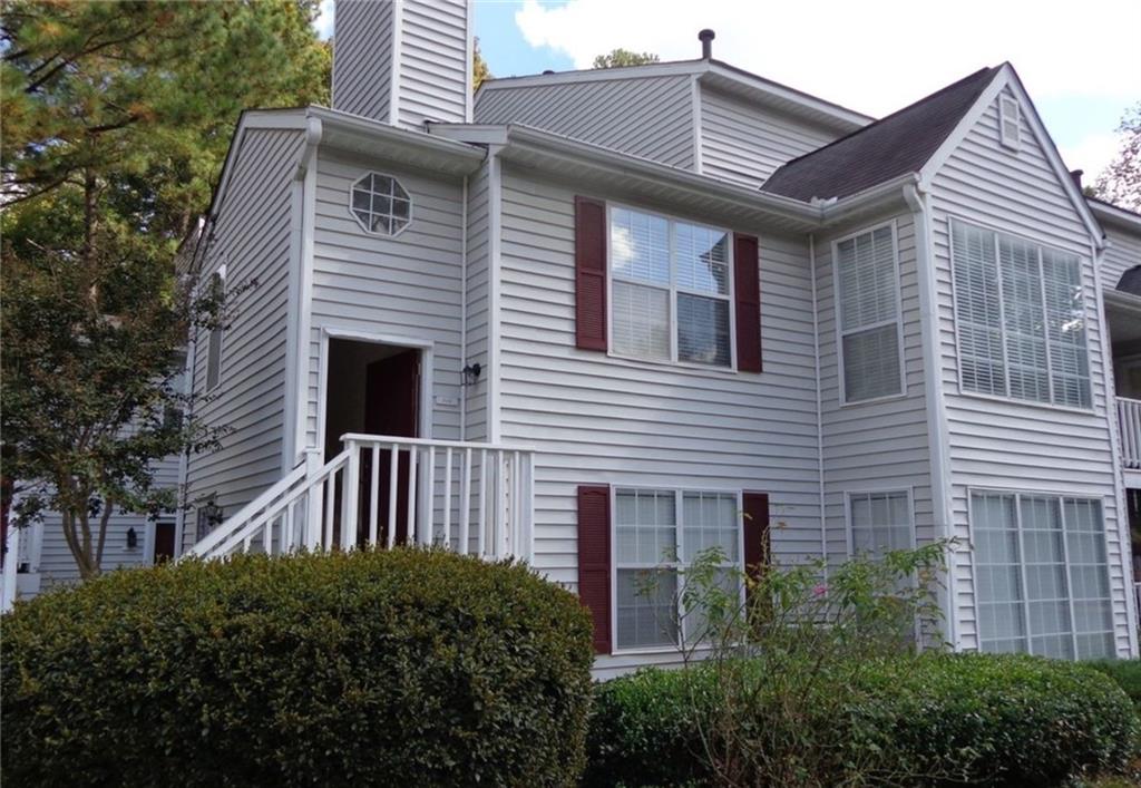 a front view of a house with balcony