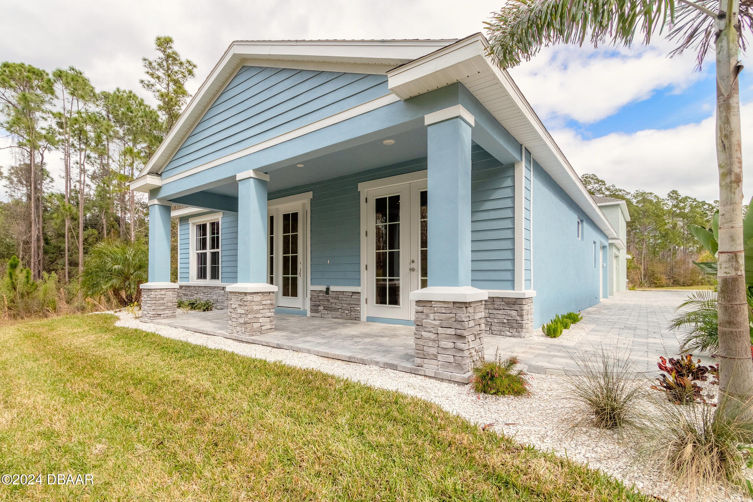 a view of a house with a patio