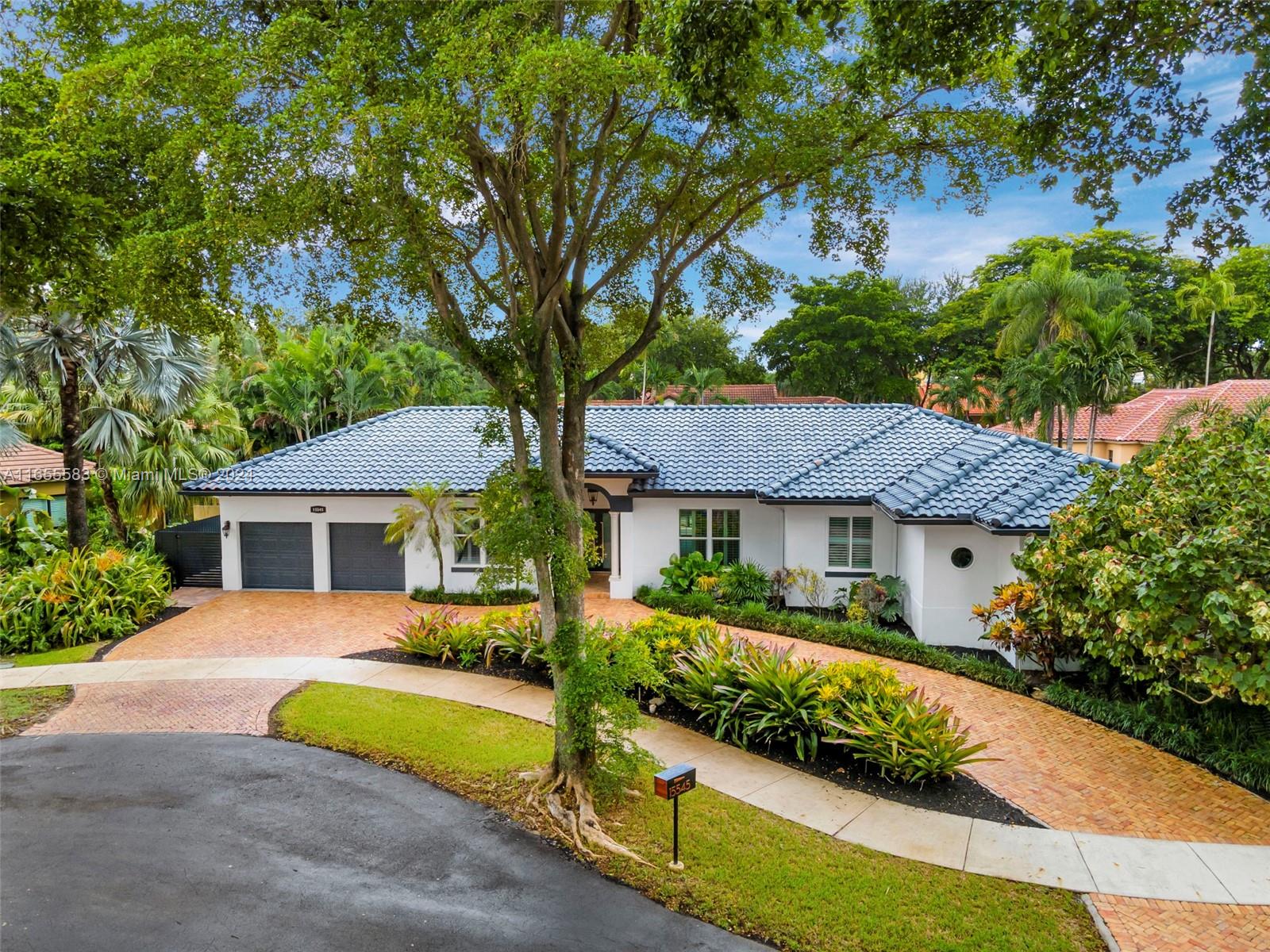 front view of house with a yard