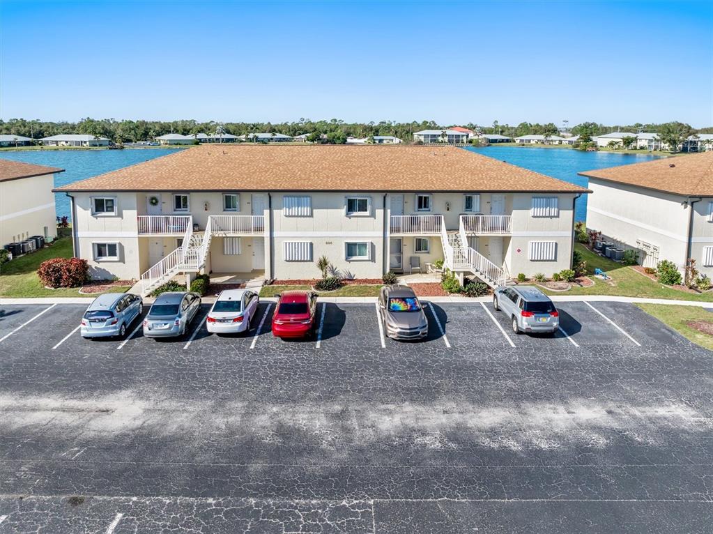 a view of cars parked in front of a building